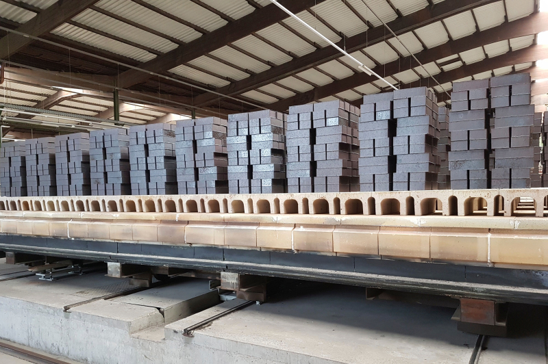 Continuous reduction firing in a tunnel kiln Brick and Tile Industry