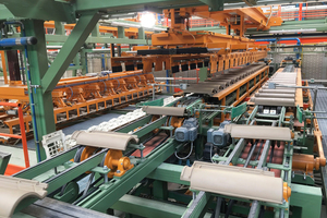 »1 The setting system is supplied by two conveyor lines 