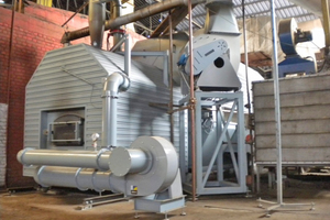  »1 Example of a Puls+GB heat generation system at a brick plant in Bosnia. A hammer mill installed below the conveyor crushes the fuel pellets to enable their pneumatic handling 