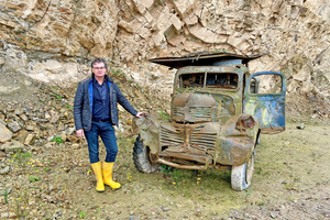  » Operations Manager Dr Willem Douw with a historical truck, used in former times 