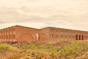  » The new school with its characteristic masonry arches 