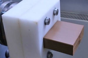  »2 Extrusion of slab-like clay specimens for the production of lab-scale bricks (top); extruded green blocks still wet from extrusion (bottom). 