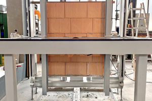  »7 View of the four-point bending test rig with built-in masonry wall constructed with vertically perforated clay blocks 