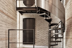  » A steel spiral staircase provides access to the viewing platform on the roof. 