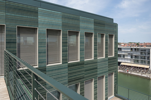  » Das Bürogebäude H7 in Münster mit grünlasierten Fassadenplatten von Moeding. 