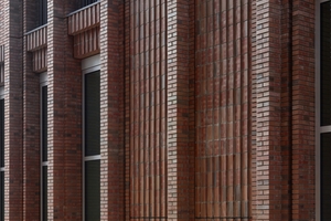  » Façade detail with sculpturally structured wall panels 