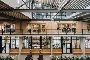  » The interior, which follows a clear vertical stratification, is also visible from the outside. The practice rooms on the ground floor open up to the inside and outside via large transparent surfaces. On the upper floor, however, the glass surfaces are significantly smaller both inside and outside 