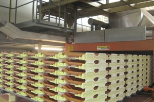  » Fired clay roofing tiles exit a kiln supplied by Keramischer Ofenbau 