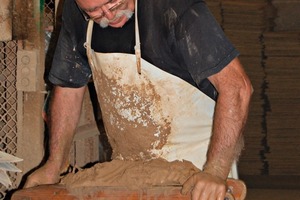  &gt;&gt;11 Making bricks by hand, moulding the body in a wooden mould 