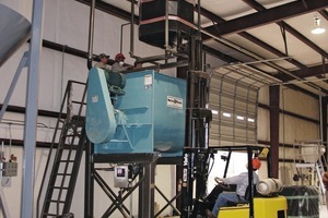  ››6 … this collecting container is then emptied into a mixer by a fork-lift truck 