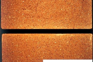  »1 Solid bricks sawn in half; above: with internal cracks, partly following lamellar planes; below: devoid of cracks 