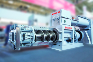  » Futura II de-airing extrusion unit comprising a type E75a/70 extruder (barrel diameter 700 mm), a type MDVG 1025f de-airing double-shaft mixer (barrel diameter 570 mm) and a ZMB Braun pressure head plus quick-change die loading system 