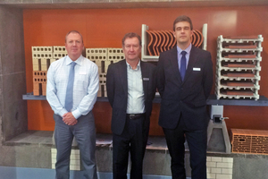  »1 Christophe Aubertot (centre) with his two colleagues Murray Anderson, General Manager Direxa Australia (left), and Clément Cadier, General Manager Direxa Brazil (right), pictured in front of the cross-section of the Skate Kiln model at ceramitec 2015 