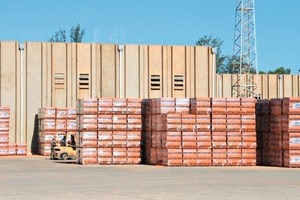  »6 Storage area with packed brick pallets 