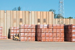  »6 Storage area with packed brick pallets 