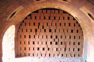  »13 Green bricks, set ready for firing 