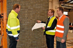  »8 Holger Kreth (left), plant manager of the CRH Albert plant; Heinrich Laue, general manager of the CRH Albert prefabricated-elements factory, and Frank Dettmer (right), operative marketing, against a finished-element backdrop 